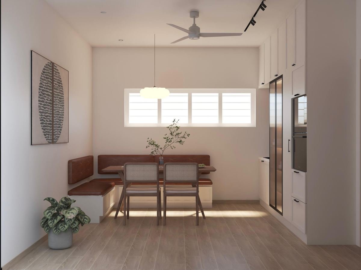 Open dining area with mint green kitchen pass-through counter