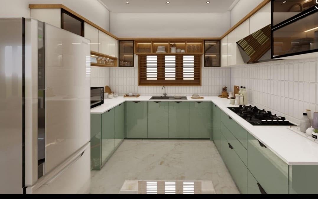 Sage green modular kitchen with brass fittings
