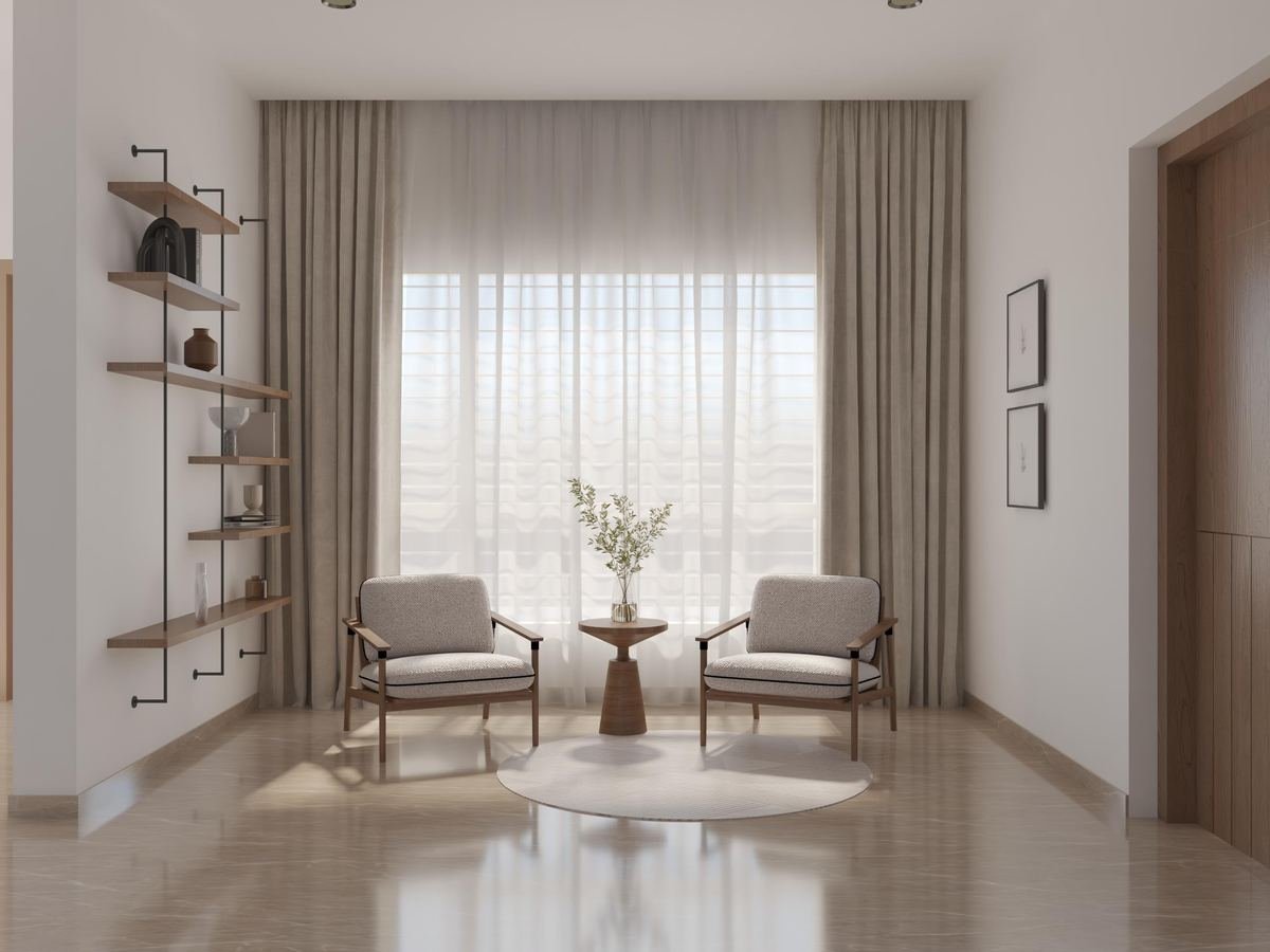 Reading lounge with two upholstered armchairs and sheer curtains